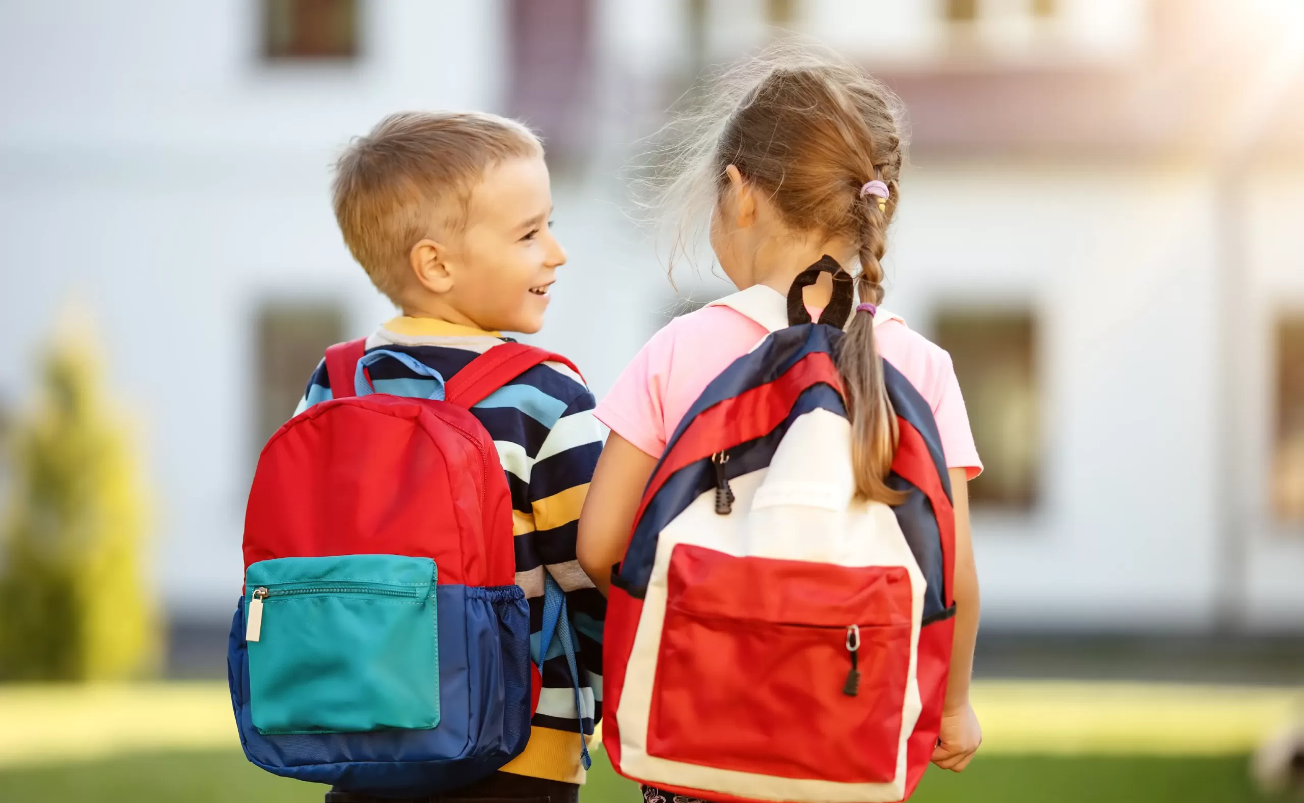 Two children preparing to enter preschool at an early learning center.